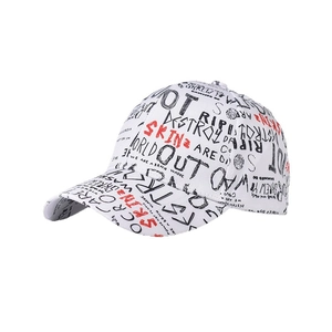 Graffiti print baseball cap in white with black and red text art for a trendy unisex look
