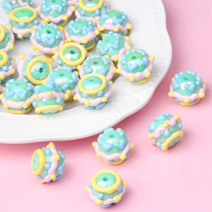 Hand-painted acrylic beads with colorful heart patterns for DIY jewelry making