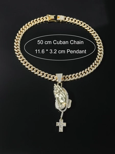 Detail of 50cm gold Cuban chain with iced-out praying hands and cross pendant