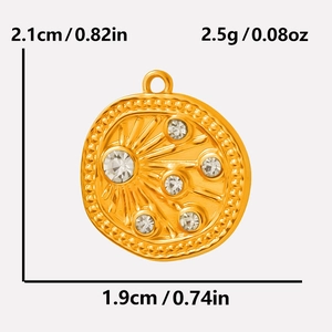 Macro detail of irregular 18k gold plated pendant with rhinestones and size specifications