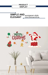 Detail of Santa Claus and Merry Christmas wall decals in a modern living room setting
