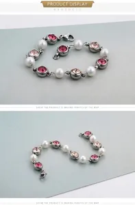 Detail showing elegant bead bracelet with pink crystals, white pearls and lobster clasp