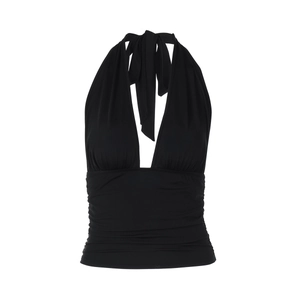 Detail of black halter neck top with deep V-neckline and ruched fabric texture