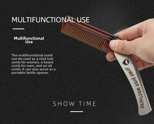 Detailed view of folding steel comb used as a versatile beard brush and bottle opener