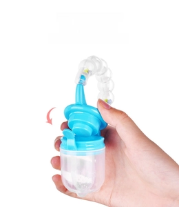 Detail of the secure locking mechanism on the blue baby fruit feeder pacifier