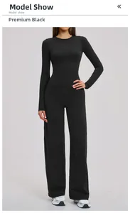 Front view of premium black brushed yoga set featuring long sleeve top and wide leg pants