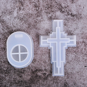 Detailed view of translucent silicone cross and oval grid molds for DIY resin casting