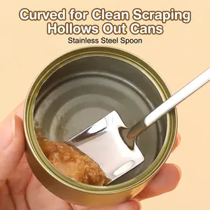 Stainless steel pet food spoon scraping cat can edges for efficient cleaning