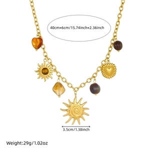 Vintage gold heart and sun pendant necklace with size details and weight info