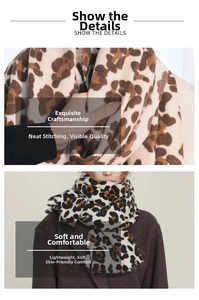 Close-up of leopard print cashmere scarf showing soft texture and tassel edge detail