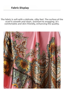 Detailed view of silk-like satin fabric with paisley patterns and glossy pink finish