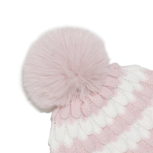 Detail of pink and white striped knit beanie featuring a fluffy pom-pom and thick texture