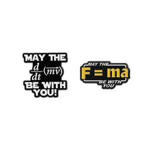 Enamel physics pins featuring 'May the F=ma be with you' quote on white background