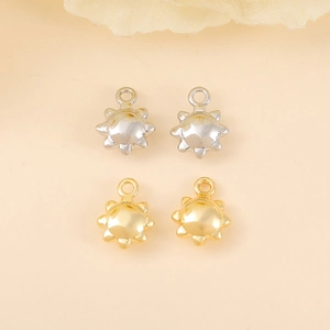Golden and silver sun pendants in metal for DIY necklace and earring jewelry making