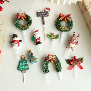 11-piece Christmas cake topper set with Santa Claus, reindeer, and wreaths for holiday party