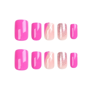 Pink and nude square press-on nails with glitter accents and white geometric line designs