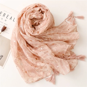 Elegant light pink scarf with metallic gold dots and fringe tassels for women