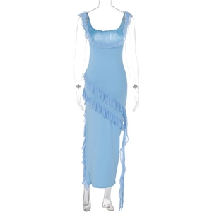 Detail view of light blue maxi dress with cascading ruffles and elegant side slit hem