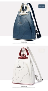 Detail of fashion backpack featuring pebbled faux leather and metal buckle closure