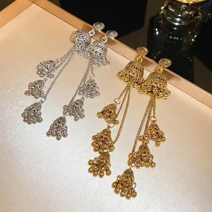Ethnic Jhumka bell tassel earrings in gold and silver finish with vintage textures