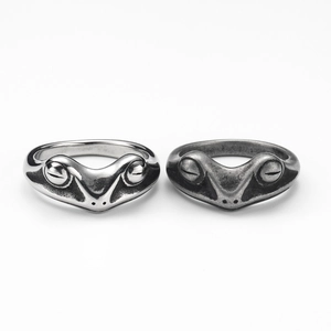 Pair of retro frog prince rings in polished silver and vintage oxidized titanium steel