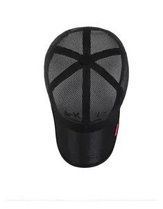 Detailed top view of black mesh baseball cap featuring red side label and fine embroidery