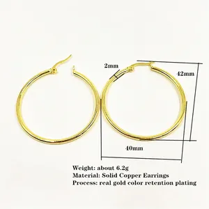 Minimalist gold plated solid copper hoop earrings for women with 42mm outer diameter