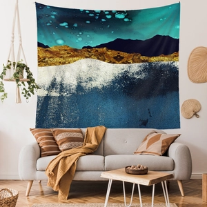 Abstract mountain wall tapestry with gold foil peaks and teal starry night sky detail