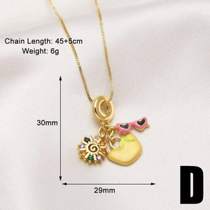 Macro shot of gold pendant necklace details with chain length and size measurement text