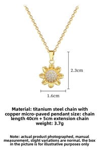Detail showing sunflower pendant dimensions 2.3cm by 1.6cm with crystal inlay
