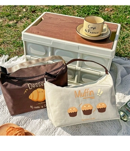 Outdoor picnic scene showing portable canvas lunch bags with cute cartoon dessert prints