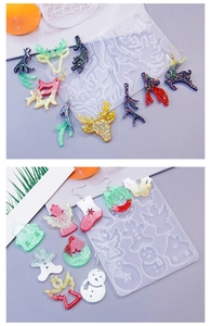 Détail macro de moules de Noël en silicone avec rennes, flocons et boucles d'oreilles résine