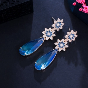 Elegant gold flower drop earrings with gradient blue water-drop crystals and zircon