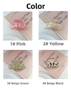 Four colors of rhinestone butterfly hair claws in pink, yellow, mint green and cream black