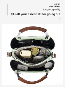 Detailed top view of light green tote bag showing spacious triple compartments and storage