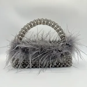 Detailed view of handmade ostrich feather beaded bag with size and 450g weight specs