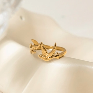 18K gold plated stainless steel open ring featuring dual flying swallow bird designs