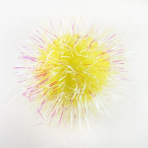 Close-up of 6cm yellow crinkle ball cat toy with iridescent shiny fibers on white background