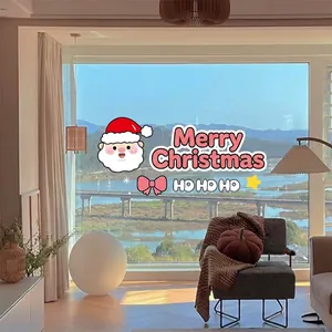 Pink bow snowman and Santa Claus static window stickers in a cozy living room scene