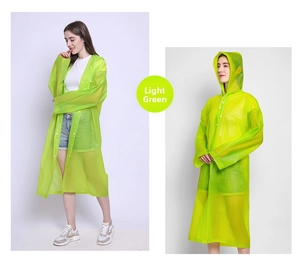 Detail view of lime green waterproof EVA raincoat with hood and white snap buttons