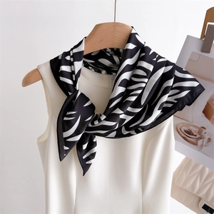 Classic black and white zebra print silk square scarf with a smooth lustrous finish