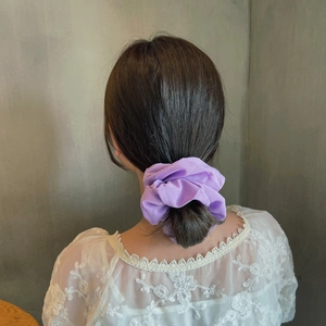 Elegant lavender chiffon oversized scrunchie on low ponytail with white lace top