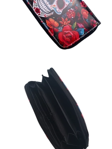 Detailed view showing card slots and skull floral pattern of long zip wallet