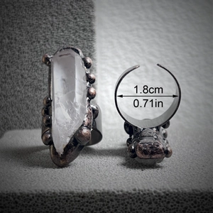 Vintage bronze adjustable ring featuring natural hexagonal clear crystal quartz stone