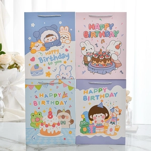 Set of 4 colorful cartoon paper gift bags with Happy Birthday illustrations and handles