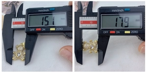Macro display of bear pendant dimensions showing 15.1mm height and 17.9mm width with zircon