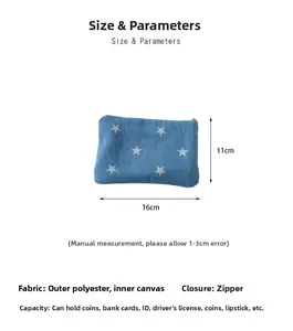 Detail view of denim star print coin purse showing 16x11cm dimensions and zipper closure