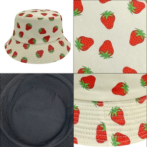 Detailed views of strawberry print bucket hat showing fabric texture and stitching