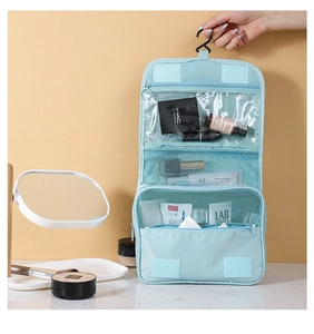 Blue hanging toiletry bag with multiple compartments and hook for summer travel storage