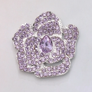Elegant purple rhinestone camellia flower charm with a polished silver alloy base